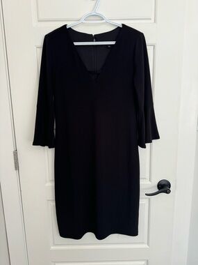Classic Black V-Neck Dress with Flared Sleeves le chateau medium